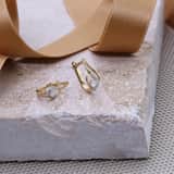 Ohrringe, 585 Gelbgold, Swirl, mit Diamant 0,18 kt