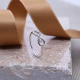 585 Weißgold-Ring, Unendlichkeitssymbol mit Diamanten
