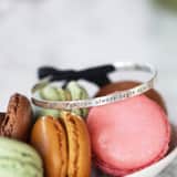 Zilveren armband tekst/zwart koord Bali