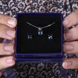 Zilveren set kristal indicolite