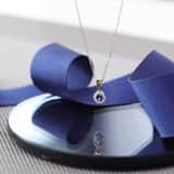 14 karaat geelgouden ketting wit&blauwe zirkonia