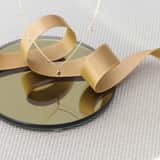 Kette aus 585 Gold mit dreifarbigen Anhängern