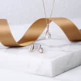 14K gouden oorbellen met parel & diamant 0,02ct