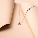 Guess stainless steel ketting met triangel hanger voor dames