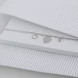 Zilveren bedelarmband harten/love