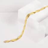 Gerecycleerd zilveren goldplated armband gedraaid