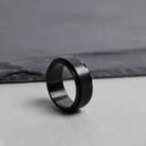 Schwarz beschichteter Anti-Stress-Ring aus Edelstahl