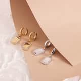 Guess stainless steel goldplated oorringen met hanger met kristal voor dames
