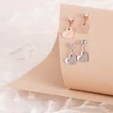 Guess stainless steel oorknoppen HEART TO HEART