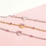 Disney stainless steel goldplated kinderarmband Minnie Mouse met wit kristal