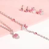 Disney stainless steel goldplated kinderketting met hanger Minnie Mouse strik met roze kristal