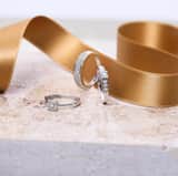 14 Karaat witgouden ring met 75 diamanten 0,20CT