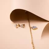 Guess stainless steel goldplated bedelarmband met hanger hart met kristal voor dames