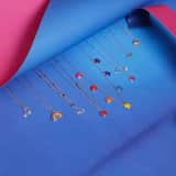 Zilveren ketting met hanger hart regenboog K3