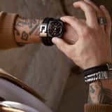 Stalen heren armband met gevlochten leer