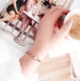 Stainless steel roséplated schakelarmband met zirkonia voor dames