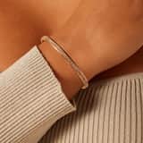Stainless steel roséplated bangle met kristal voor dames