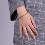 Goldplated fantasiearmband met groen kristal voor dames