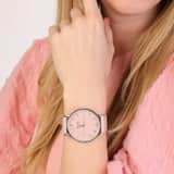 Regal horloge met een roze pu leren band