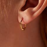 Ohrringe aus 375 Gold, oval, mit Muster