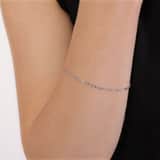 375 Gold gedrehtes Armband mit Gourmet-Gliedern und Diamantschliff