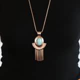 Bijoux goudkleurige ketting met hanger met blauwe steen voor dames