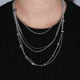 Zilverkleurige byoux ketting multil layer