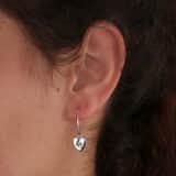 Zilverkleurige bijoux oorbellen hart