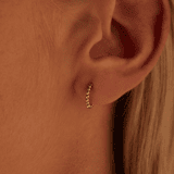 Zilveren goldplated oorringen met bolletjes voor dames