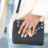 Zwarte tas met goudkleurige studs