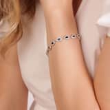 Zilveren armband druppels met blauwe zirkonia