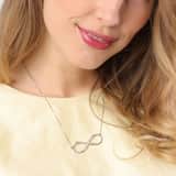 Zilveren naamketting infinity zirkonia voor dames