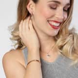 Guess stainless steel roséplated ketting met hanger met kristal voor dames