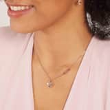 Edelstahlkette von Guess, rotvergoldet, Anhänger, Herz, Logo