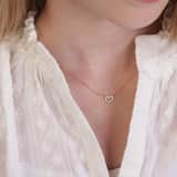 Zilveren goldplated kinderketting met hanger hart met zirkonia