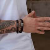 Herrenarmband, Edelstahl, mit geflochtenem, schwarzem Leder