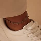 Gerecycled dubbele stainless steel enkelband met bedeltjes