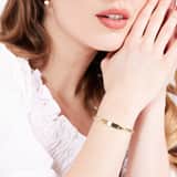 Zilveren goldplated plaatarmband met hartschakel voor dames