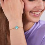 Stainless steel goldplated fantasiearmband met hanger bloem met turquoise voor dames