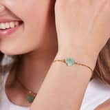 Stainless steel goldplated fantasiearmband met hanger met groene aventurijn voor dames