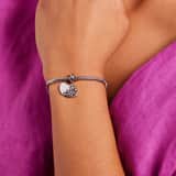 Stainless steel bedel hart met levensboom