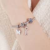 Bettelarmband-Anhänger aus Edelstahl, Kugel, mit blauen Zirkonia