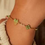 Disney stainless steel goldplated kinderbedelarmband met hanger Minnie Mouse met zirkonia