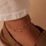 Stainless steel goldplated enkelband met bedeltjes voor dames