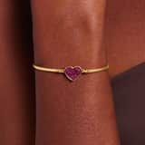 Stainless steel goldplated fantasiearmband met hanger hart met paars kristal voor dames