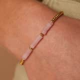Stainless steel goldplated fantasiearmband met rozenkwarts voor dames