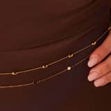 Stalen goldplated bodychain dubbel met disc