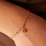 Stainless steel goldplated fantasiearmband met geboortesteen Oktober voor dames
