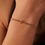 Stainless steel goldplated fantasiearmband met letterhanger F met zirkonia voor dames
