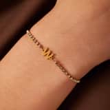 Tennisarmband aus Edelstahl, vergoldet, mit weißem kubischem Zirkonia, Buchstabe: M